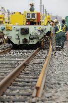 Work scene of the REXS Shinkansen rail replacement system